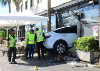 Israeli drives Tesla into coffee shop in bizarre accident