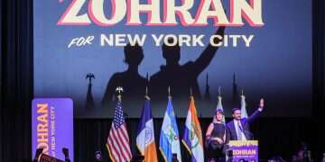 Mayor-elect of New York City Zohran Mamdani (L) and his spouse Rama Duwaji (R) wave to the crowd during an election night party hosted by the Democratic nominee in the Brooklyn borough of New York What Mamdani's Muslim-Shiite faith means