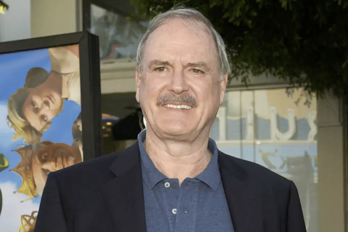 John Cleese offers to perform in Israel for free after postponing shows