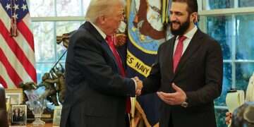 President Donald Trump (L) shakes hands with Syria's President Ahmad al-Sharaa, at the White House in Washington, Monday, Nov. 10, 2025 'A terrorist in a suit': Syrian leader's evasive answers spark backlash