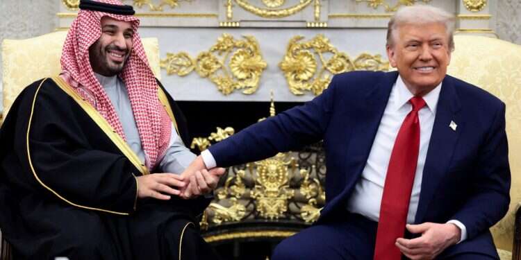Saudi Crown Prince and Prime Minister Mohammed bin Salman holds US President Donald Trump's hand during a meeting in the Oval Office at the White House in Washington, DC, November 18, 2025 Security guarantees in the face of Arab normalization