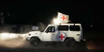 Red Cross convoy carrying the body of a person believed to be a deceased hostage handed over by Hamas makes its way toward the border crossing with Israel, to be transferred to Israeli authorities, in Deir al-Balah, central Gaza Strip, Nov. 13, 2025 IDF receives deceased hostage retrieved from Gaza