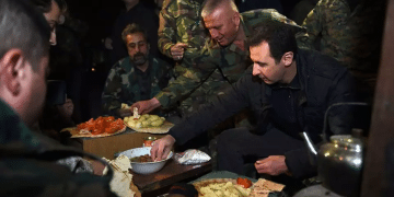 Bashar Assad having a meal with soldiers Austria charges Assad regime general who allegedly served as Mossad double agent