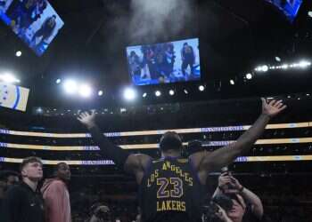 LeBron James makes historic season debut