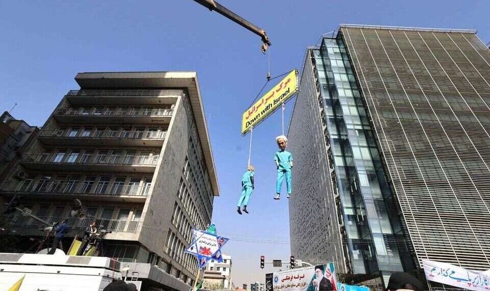 Iranian Parliament Speaker Mohammad Bagher Qalibaf delivered the keynote address at the Tehran rally Iran hangs Trump, Netanyahu effigies