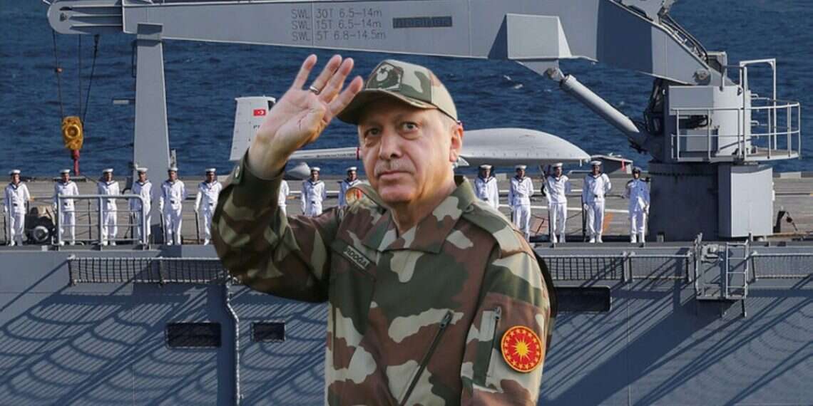 Turkish navy soldiers stand on the deck of the TCG Anadolu, Turkey's first amphibious assault ship (front: President Erdogan) Turkey secretly building Somalia space base to boost missile range