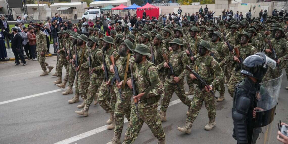 'Zionist enemy': Slogan expose link between Hamas, Syria