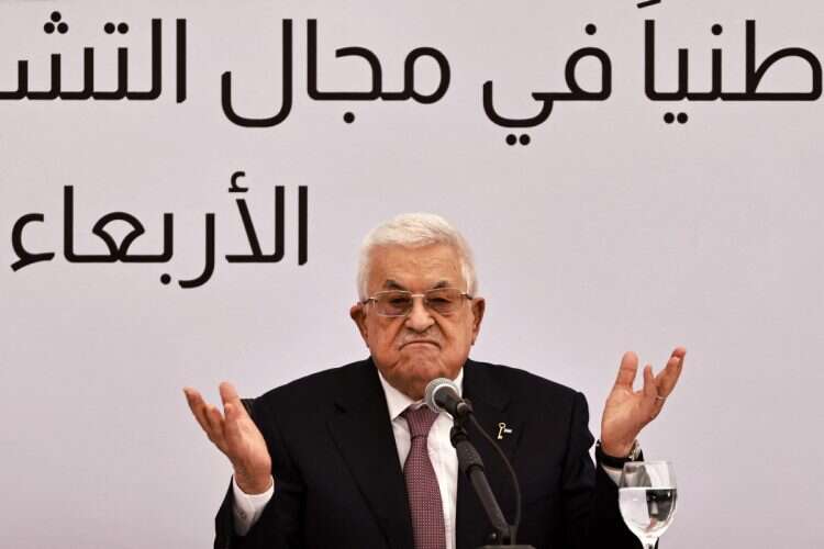 Palestinian Authority President Mahmud Abbas gestures as he delivers a speech during the opening of the Istishsari cancer centre in Ramallah on May 14, 2025