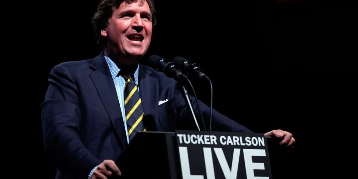 Tucker Carlson speaks at a Tucker Carlson Live Tour show at Desert Diamond Arena, Oct. 31, 2024, in Glendale, Arizona | Photo: Julia Demaree Nikhinson/AP INTO THE FRAY: Strange bedfellows in hate, from Carlson to the Caucasus
