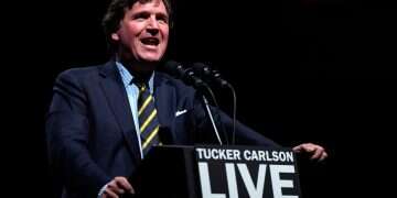 Tucker Carlson speaks at a Tucker Carlson Live Tour show at Desert Diamond Arena, Oct. 31, 2024, in Glendale, Arizona | Photo: Julia Demaree Nikhinson/AP INTO THE FRAY: Strange bedfellows in hate, from Carlson to the Caucasus