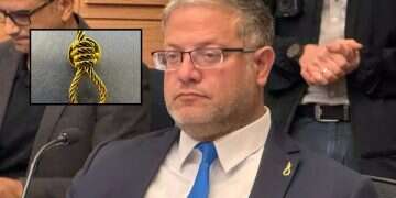 Minister wears yellow 'noose pin' to promote terrorists' executions