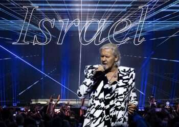 Johnny Logan against the backdrop of the Israeli entry to the 2025 Eurovision Song Contest Johnny Logan demands Israel's expulsion from Eurovision
