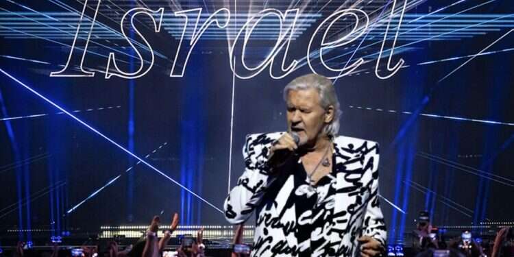 Johnny Logan against the backdrop of the Israeli entry to the 2025 Eurovision Song Contest Johnny Logan demands Israel's expulsion from Eurovision