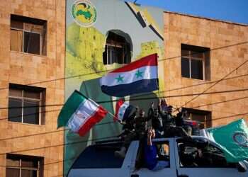 A view shows a damaged poster of Syria's President Bashar al-Assad in Aleppo, after the Syrian army said that dozens of its soldiers had been killed in a major attack by rebels who swept into the city, in Syria November 30, 2024 Revealed: Iran's message to Assad days before his fall
