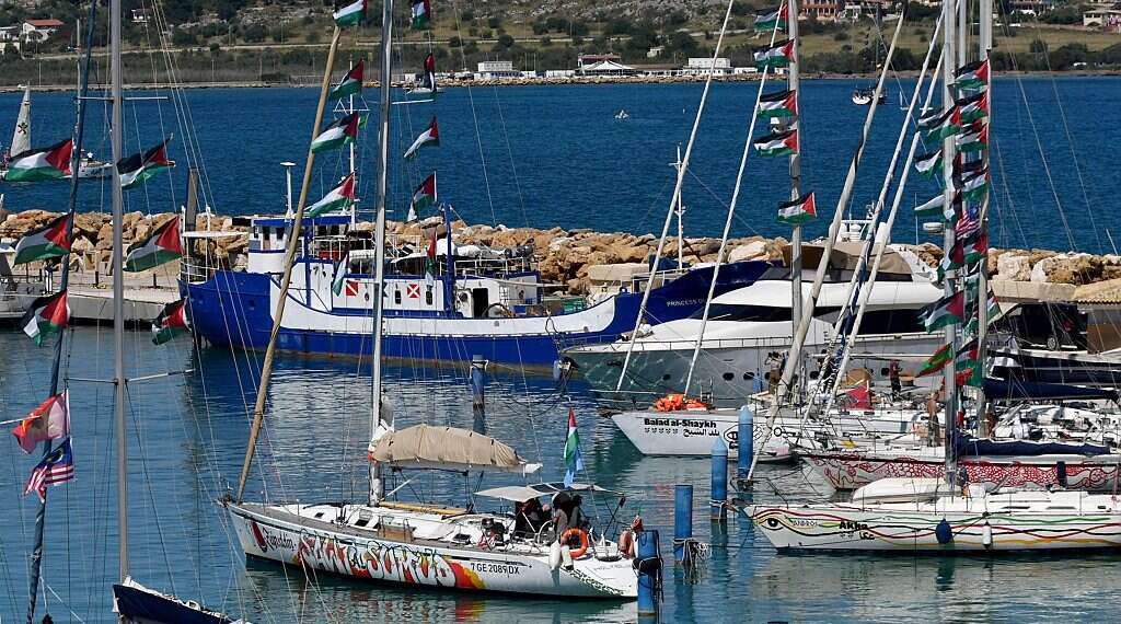 Vessels participating in the Global Sumud Flotilla (GSF) depart from the Port of Xiphonia in Augusta, near Syracuse, Sicily island, southern Italy, 26 April 2026 68-vessel flotilla heads for Gaza as Netanyahu convenes emergency security talks