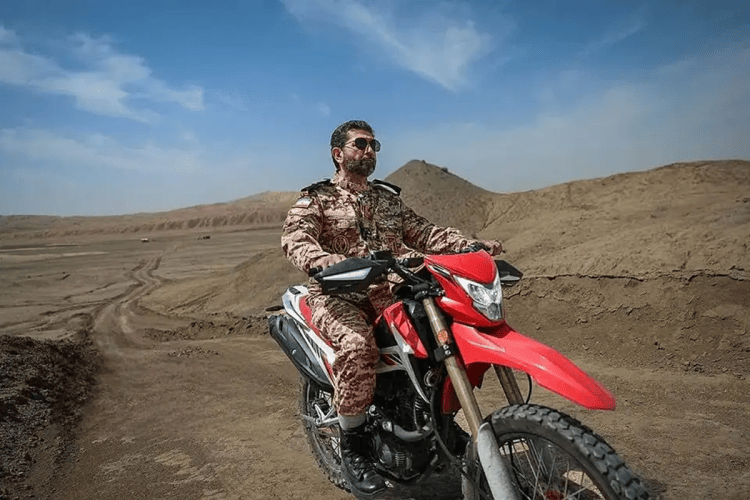 A Revolutionary Guards commander during a drill simulating an American invasion A Revolutionary Guards commander during a drill simulating an American invasion