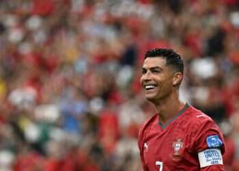 Portugal's forward Cristiano Ronaldo reacts to his team's fourth goal during the 2026 World Cup Group K football match between Portugal and Uzbekistan at the Houston Stadium in Houston on June 23, 2026 Cristiano Ronaldo makes history as first player to score in 6 World Cups