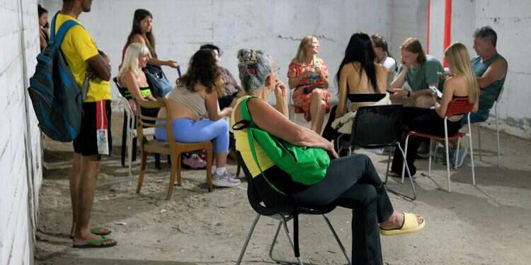 People sit in a shelter during Operation Rising Lion, Israel, June 25, 2025 On hold until it's over