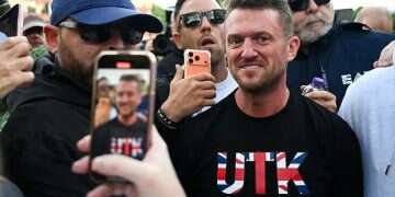 Tommy Robinson at a protest in Britain. Photo Reuters Tommy Robinson at a protest in Britain