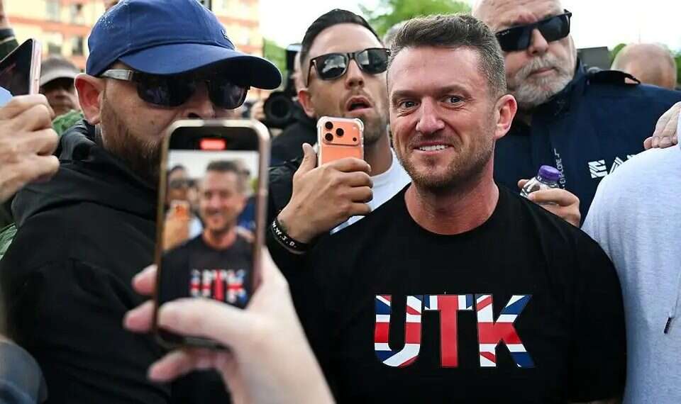 Tommy Robinson at a protest in Britain. Photo Reuters Tommy Robinson at a protest in Britain