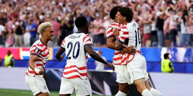 US national team celebrates. Photo: Reuters US opens World Cup with 4-1 win over Paraguay
