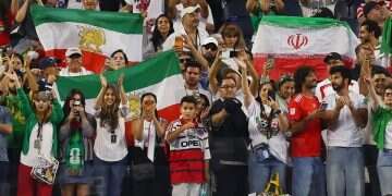After boos during Iran's anthem, regime supporters and opponents find common ground