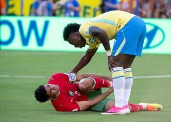 Vinicius Junior stands over Achraf Hakimi as he lies on the pitch. Photo: Shahar Azran Vinicius Junior wonder goal not enough for Brazil against Morocco
