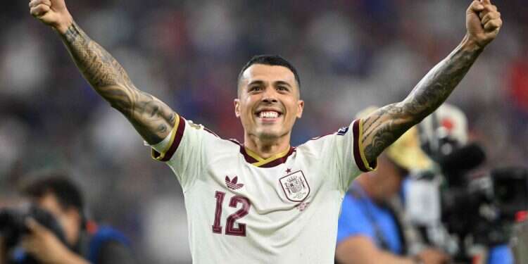 Spain's defender #12 Pedro Porro celebrates after his team won the 2026 World Cup football tournament semi-final match between France and Spain at the Dallas Stadium in Arlington on July 14, 2026 Spain matches unbeaten record after World Cup semifinal victory over France