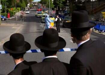 Ultra-Orthodox Jewish youths near the scene of a terrorist attack targeting Jews in Golders Green, London. Photo: AP UK unveils £250 million emergency plan to protect Jewish communities