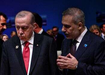 Hakan Fidan with Erdogan. Photo: EPA Hakan Fidan with Erdogan