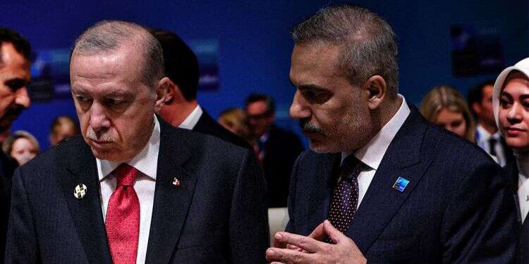 Hakan Fidan with Erdogan. Photo: EPA Hakan Fidan with Erdogan