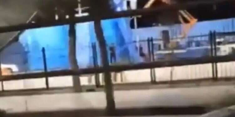 As world watches Hormuz, Iran erects gallows in protest square