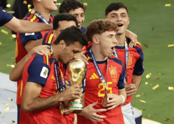 Rodri #16 of Spain kisses the FIFA World Cup trophy Terror groups praise Spain's World Cup victory over Argentina