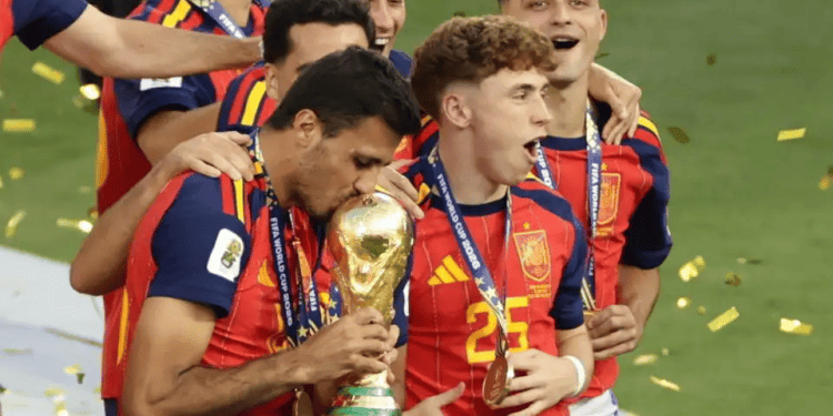 Rodri #16 of Spain kisses the FIFA World Cup trophy Terror groups praise Spain's World Cup victory over Argentina