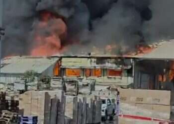 Massive fire at Strauss and Tapugan warehouses in Sderot Massive fire at Strauss and Tapugan warehouses in Sderot, hazardous materials leak feared