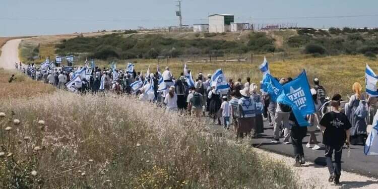 Members of the Nachala movement prepare for a march toward Gaza several months ago Thousands plan to march toward Gaza as IDF declares border area closed military zone