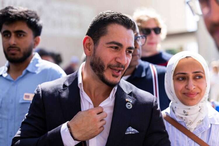 Michigan Democratic Senate primary winner Abdul El-Sayed arrives with his wife, Sarah Jukaku, to a press conference in front of the Spirit of Detroit on August 5, 2026
