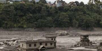 Mud covers a property following a flash flood at Trishuli in Nuwakot district, Nepal, August 26, 2026 9 dead as flash floods devastate Nepal-Tibet region; hundreds of tourists unaccounted for
