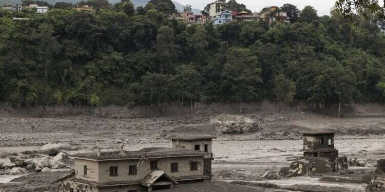 Flash floods devastate Nepal-Tibet region; hundreds of tourists unaccounted for
