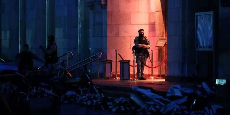 A police officer stands outside the restaurant where the explosion occurred in Moscow. Photo: Reuters Senior Russian commander reportedly targeted in Moscow bombing