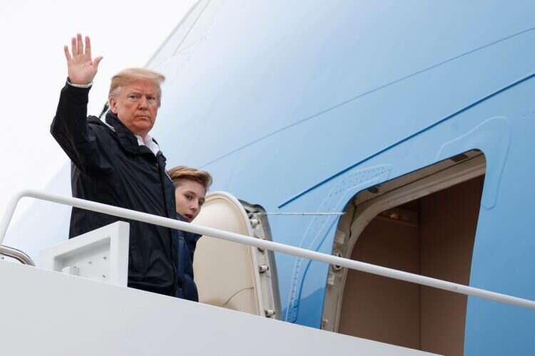 President Donald Trump and his son Barron Trump, board Air Force One, Friday, March 8, 2019, in Andrews Air Force Base, Md., en route to Lee County, Ala.