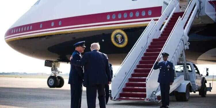 Trump boards the new Air Force One. Photo: AFP Trump secretly moved in catering truck to alternate jet amid Iranian threat