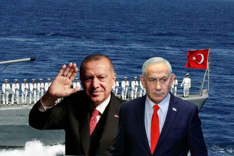 Turkish sailors stand still on the deck of naval ship Bodrum during the the Sea Wolf-2009 Military Exercise in the Aegean. Front: President Recep Erdogan and Prime Minister Benjamin Netanyahu