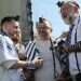 Bar Kuperstein at a mass tefillin-laying event in Hostages Square. Photo: Gideon Markowicz. Bar Kuperstein at a mass tefillin-laying event in Hostages Square. Photo: Gideon Markowicz.