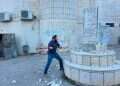 Tzvi Sukkot after taking a sledgehammer to destroy a terrorist shrine MK takes sledgehammer to Palestinian town – smashes terror shrines