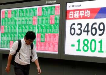 Asian stocks sink on crude oil surge