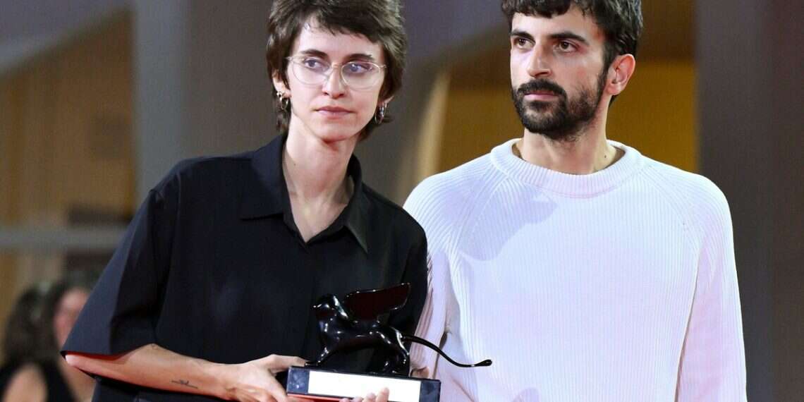 Israeli directors Rachel Szor (R) and Yuval Abraham hold the Special Jury Prize for their film 'NAZA' during the closing ceremony of the 83rd annual Venice International Film Festival in Venice, Italy, 12 September 2026. Israel Film Council demands urgent screening amid "NAZA" backlash