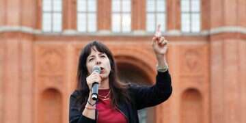 Top candidate for the upcoming election in Berlin of The Left party (Die Linke), Elif Eralp, speaks in front of the Red Town Hall during the final election campaign rally of The Left (Die Linke) party prior to the House of Representatives election in Berlin, Germany, 18 September 2026. 'Berlin's Mamdani' surges to victory as Jewish leaders sound alarm