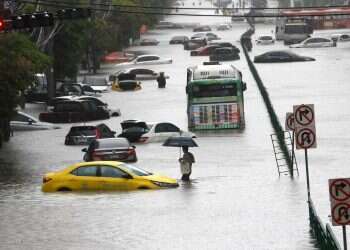 Bangkok floods prompt disaster declaration as thousands flee to shelters
