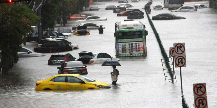 Bangkok floods prompt disaster declaration as thousands flee to shelters